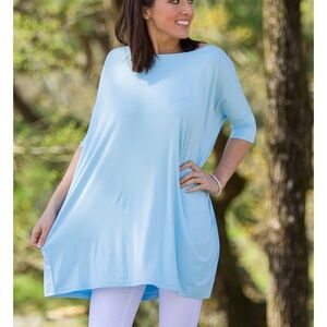 Women’s baby blue, half sleeve, PIKO top. Size XS. NWT